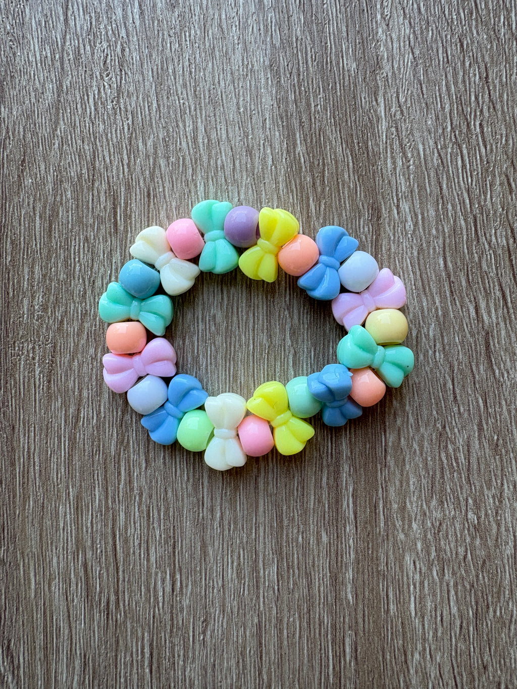 Bracciale perline pastello fiocco