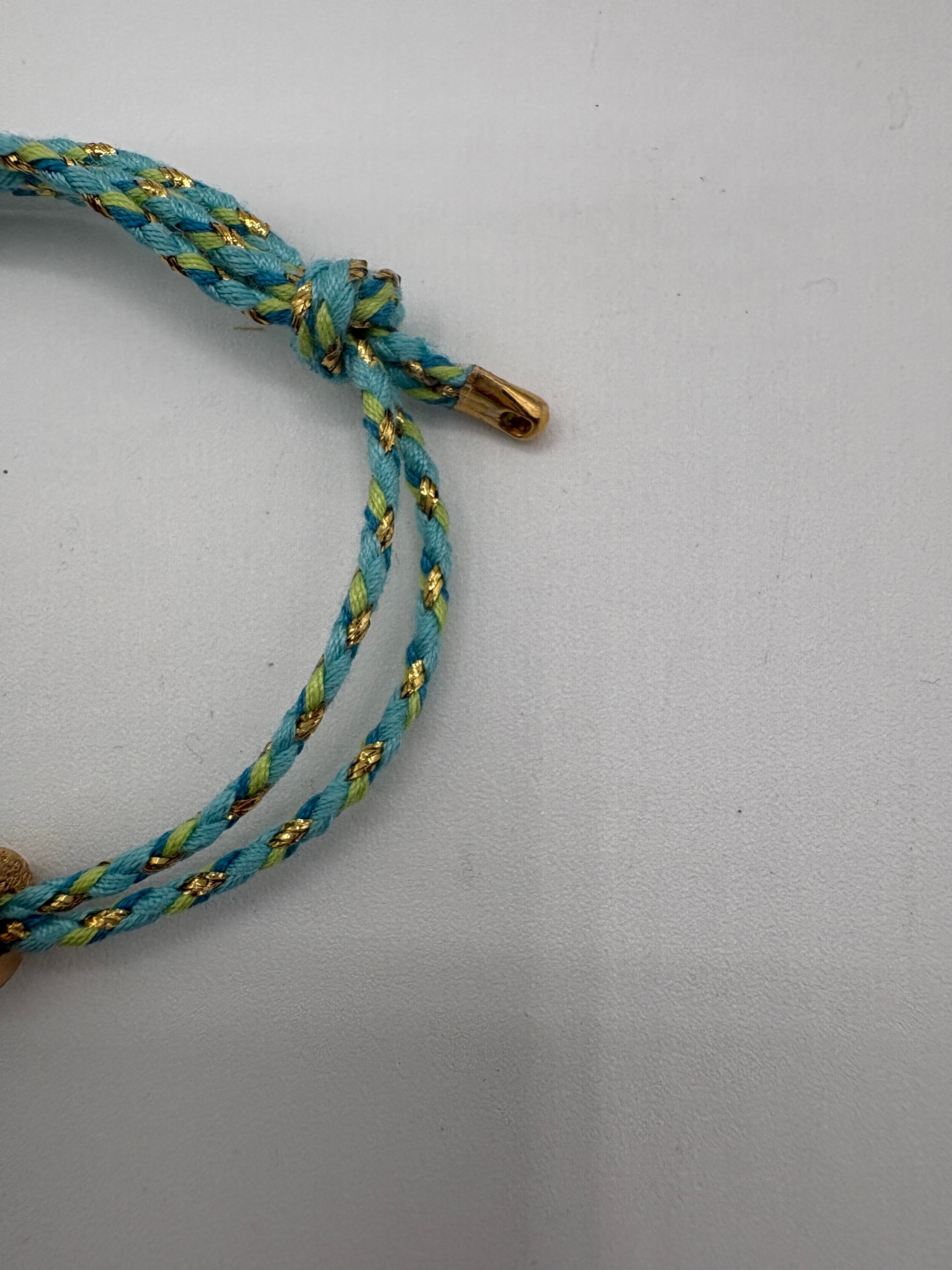 Bracciale con beads dorati e turchese