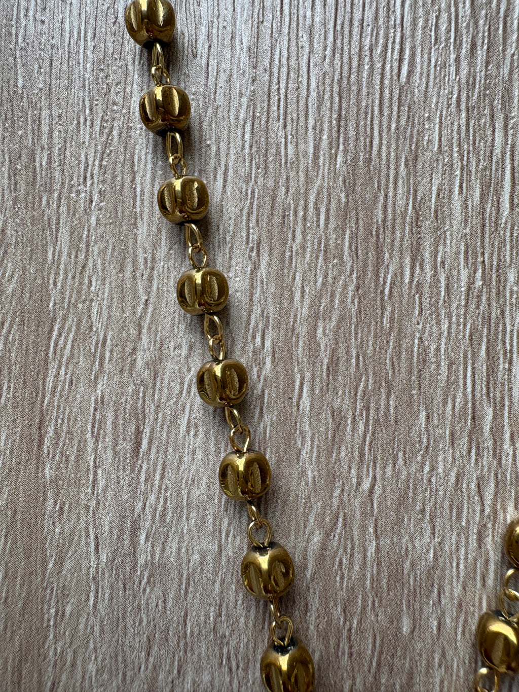 Collana corno in acciaio dorato