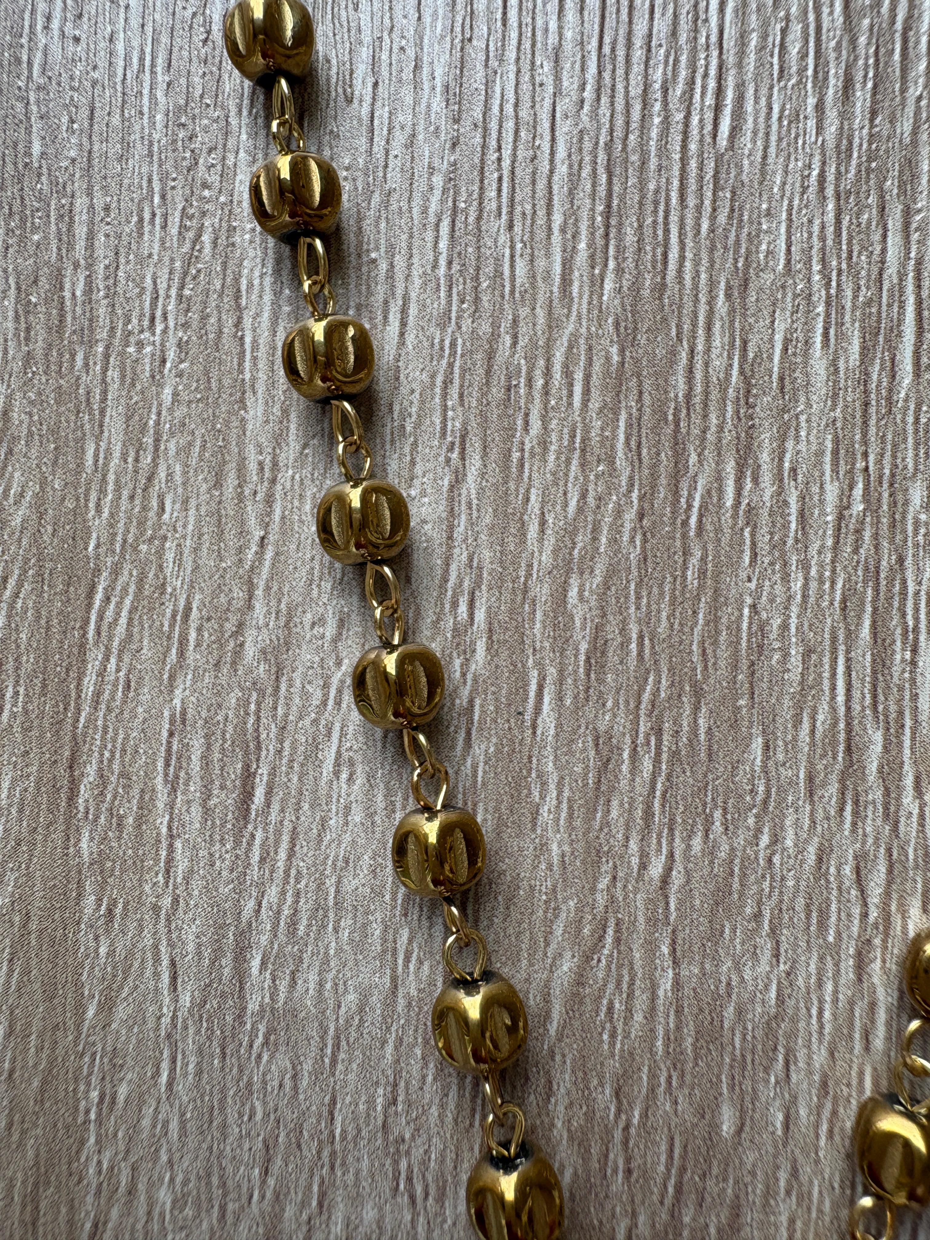 Collana corno in acciaio dorato