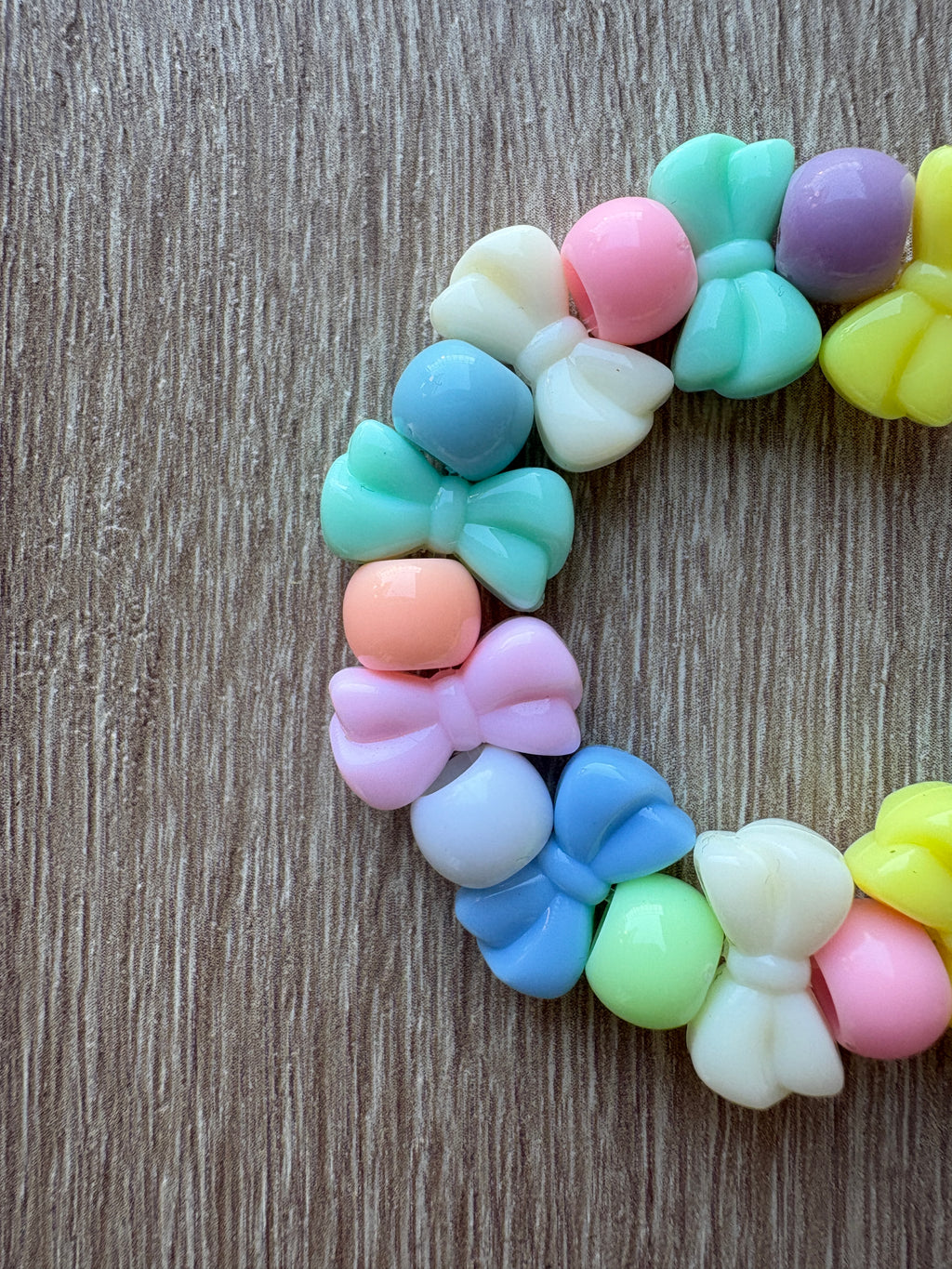 Bracciale perline pastello fiocco