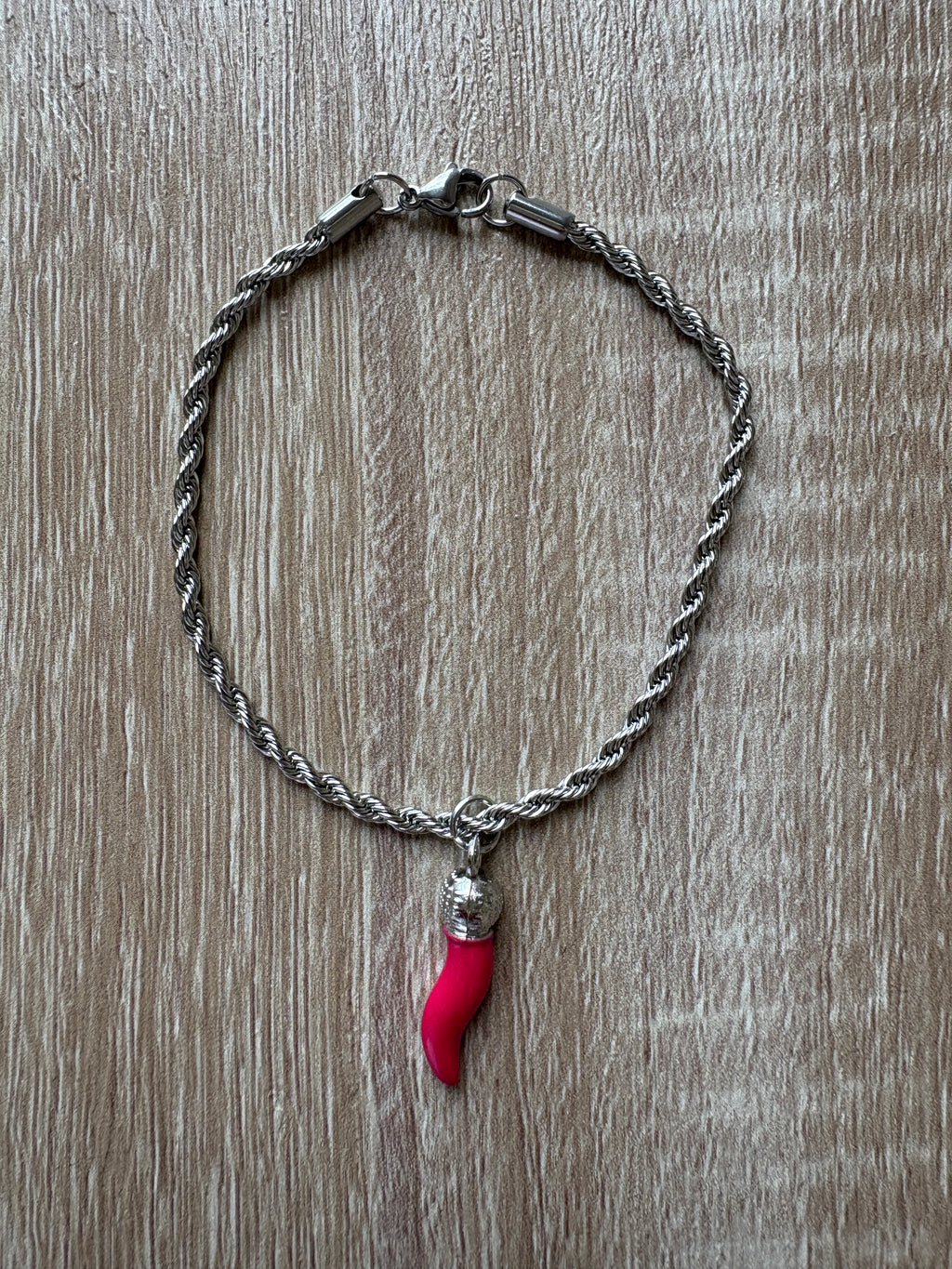 Bracciale maglia marina con corno fucsia