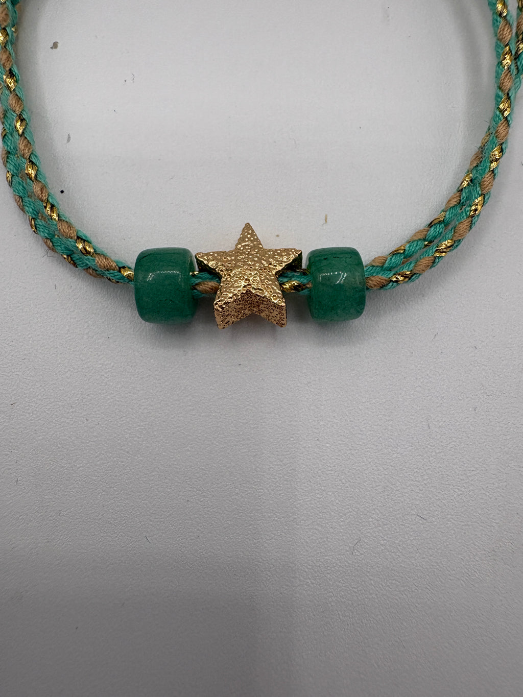 Bracciale beads colorati con stella dorata