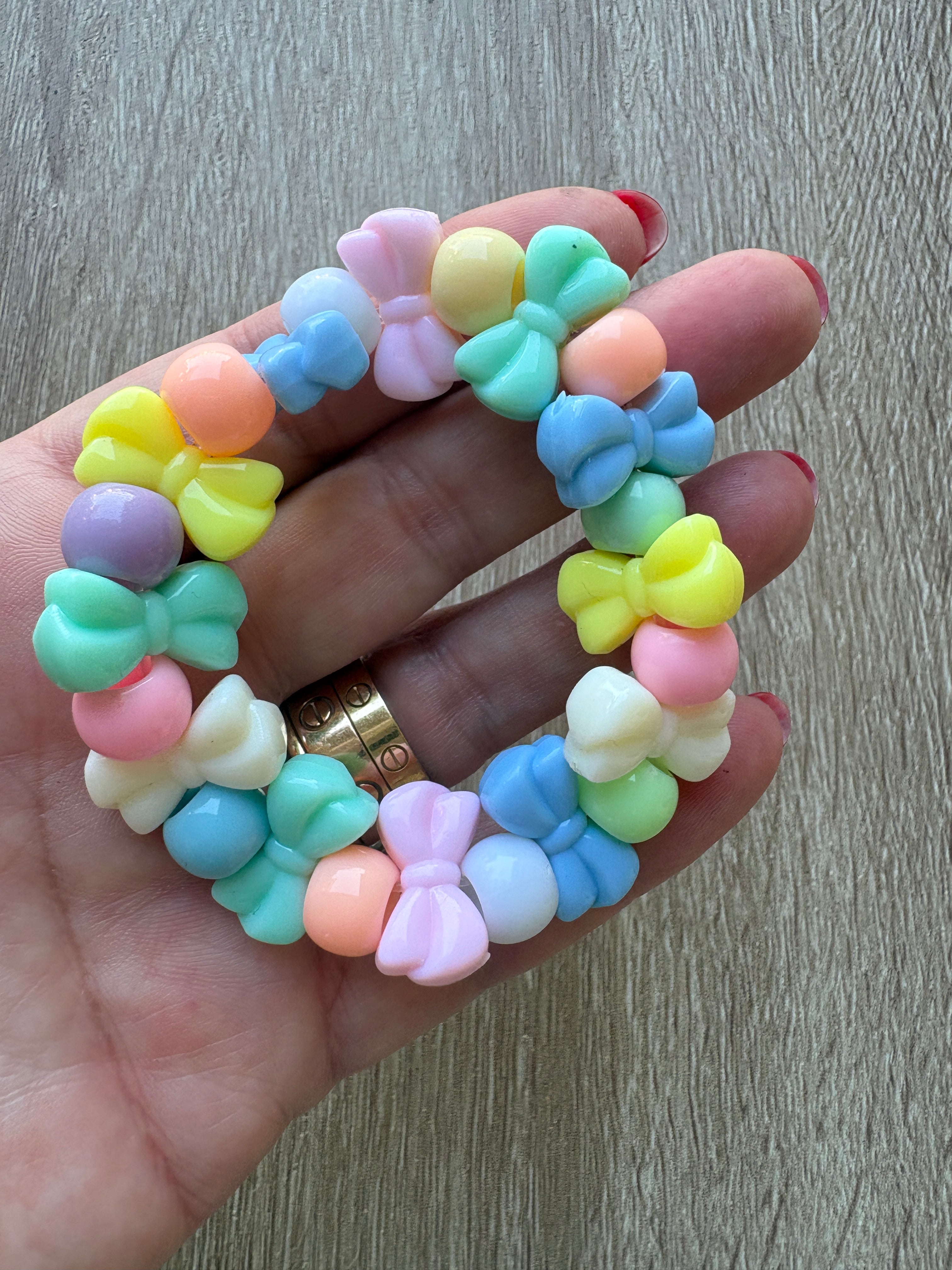 Bracciale perline pastello fiocco