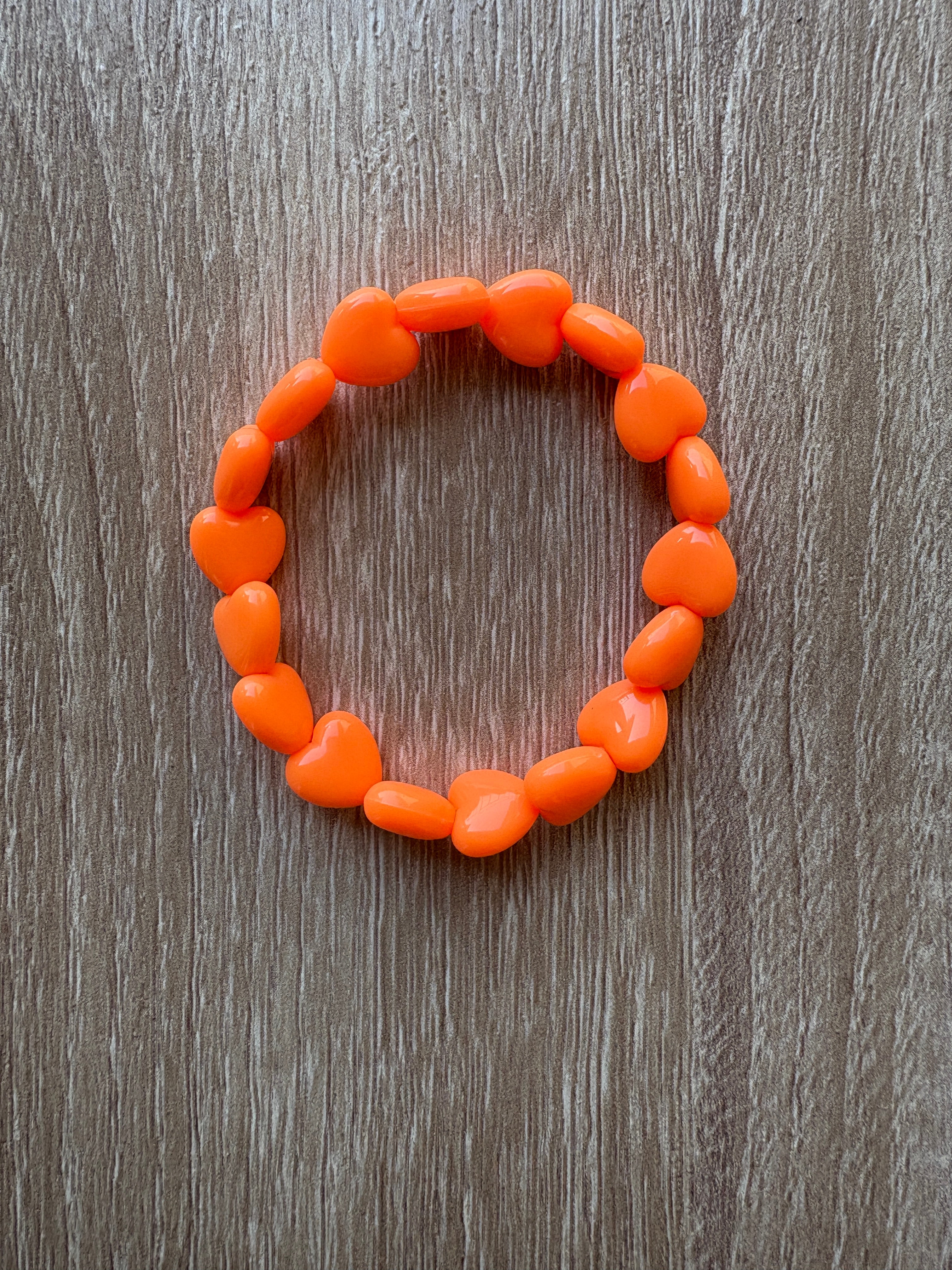 Bracciale cuore arancio fluo