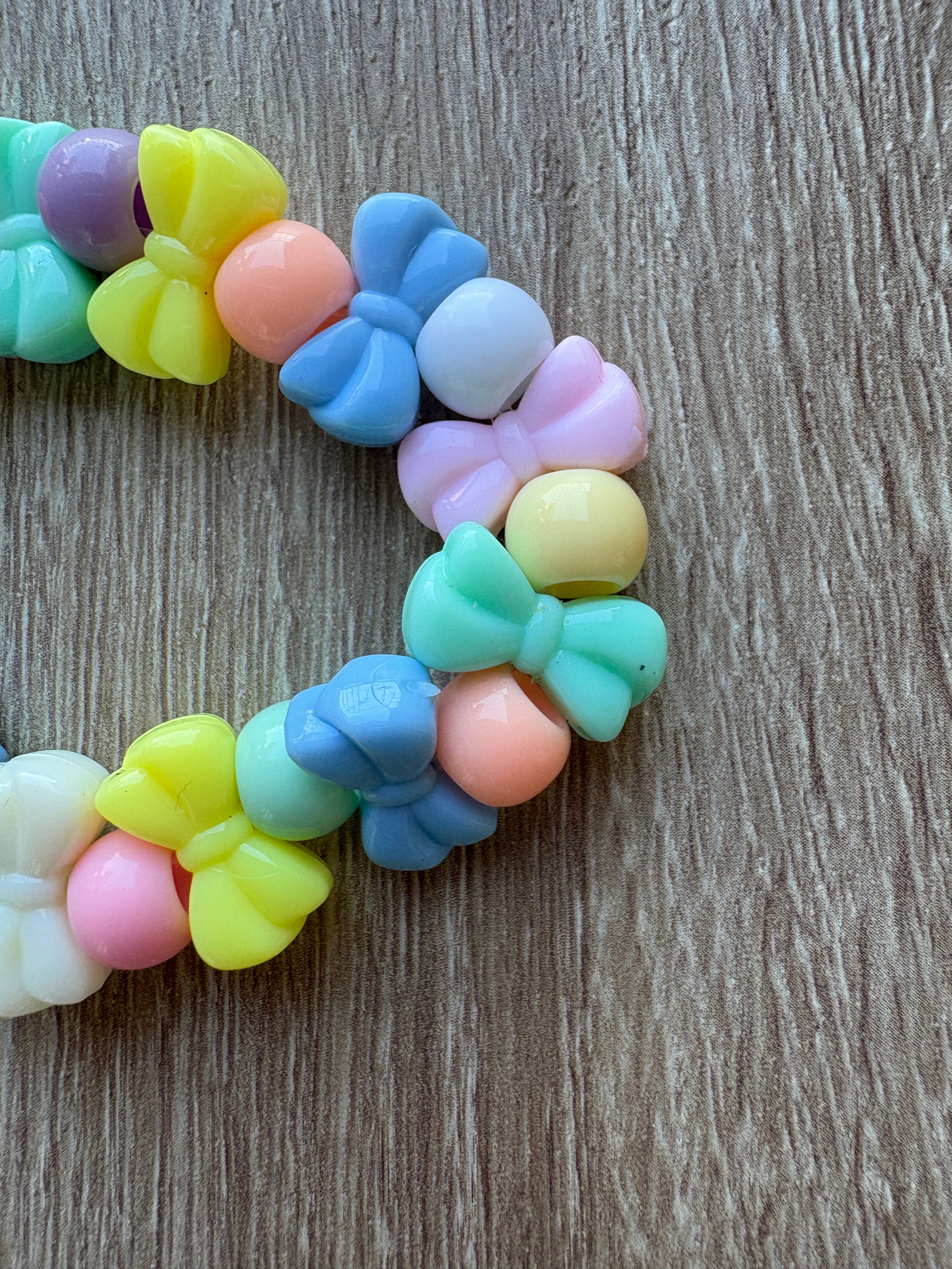 Bracciale perline pastello fiocco