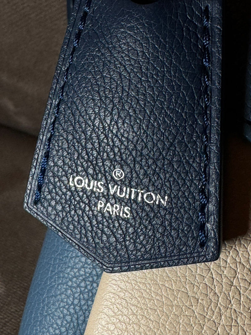 Louis Vuitton lock me