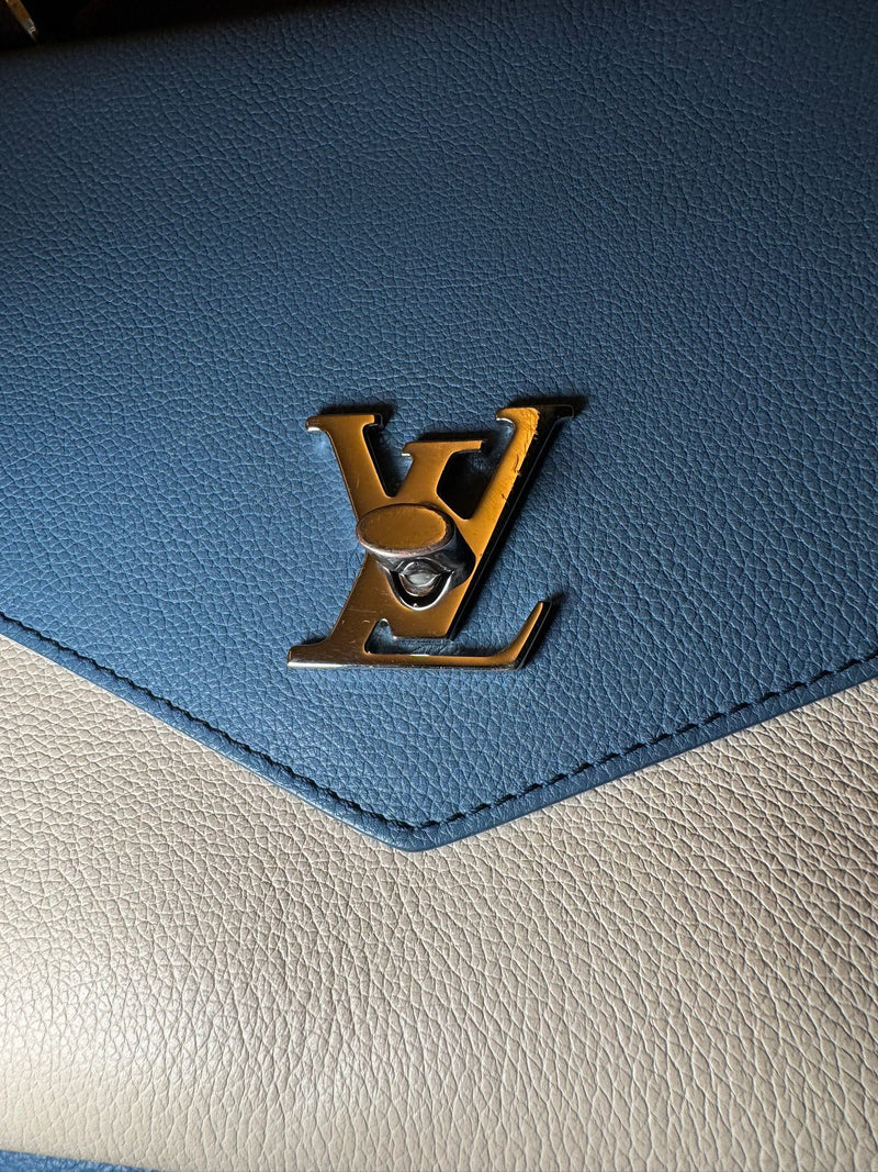 Louis Vuitton lock me