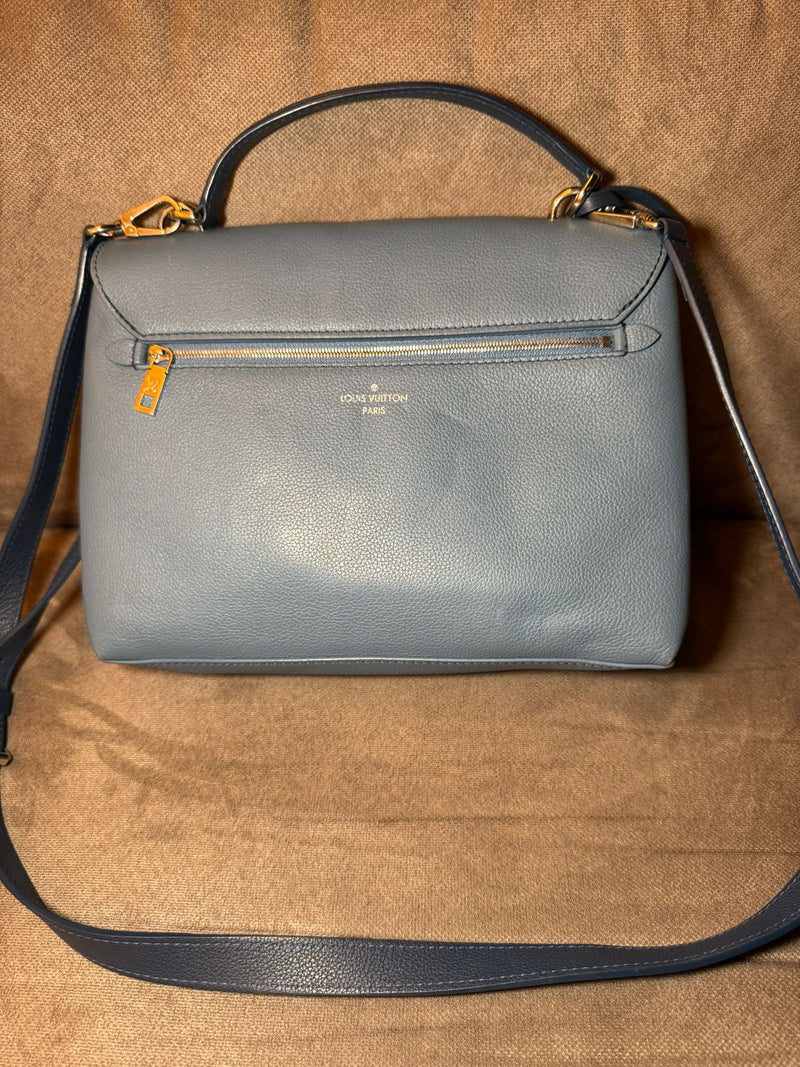 Louis Vuitton lock me